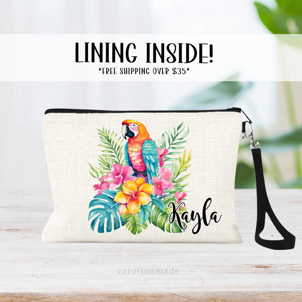 This linen zipper pouch features a pretty tropical floral palm leaf design with a large parrot. It is personalized in the corner with your name.