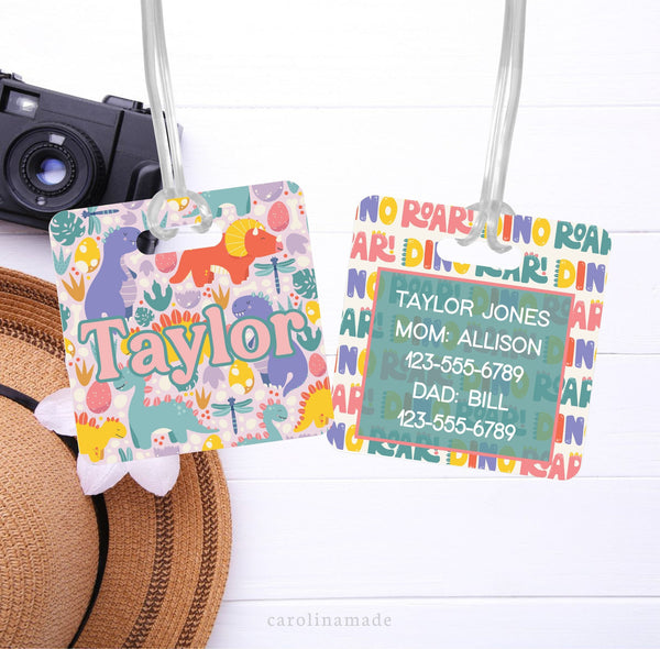 This Id tag features a fun dino print on the front with your childs name. And a second design on the back that says Roar! The back is personalized parents information.