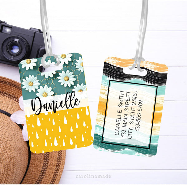 This luggage id tag features a Teal Daisy and Yellow rain drops design on the front with your name. The back has matching teal, yellow and black brush strokes. It is personalized with your contact information.