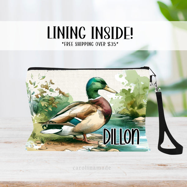 This linen zipper pouch features a beautiful watercolor design of a mallard duck next to water. It is personalized in the corner with your name.