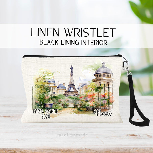 This beautiful watercolor Paris France Eiffel Tower Design is centered on the linen wristlet with Paris France and the year on the left corner and your name personalized on the right corner.