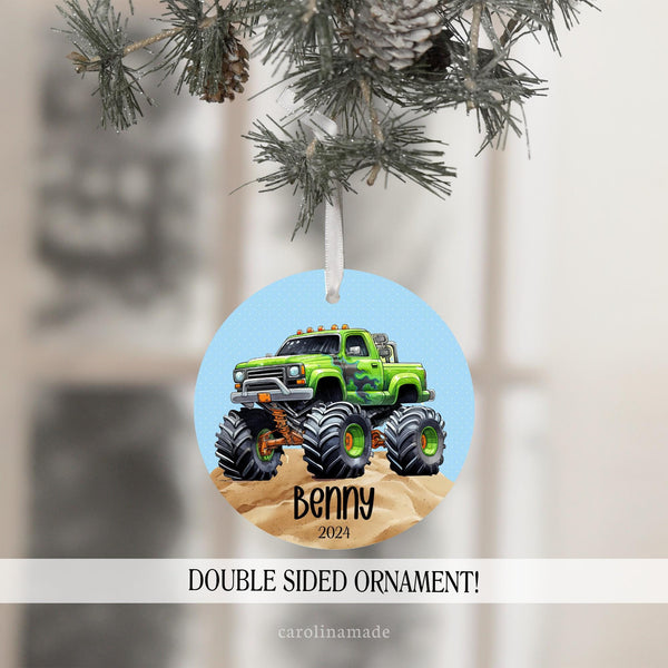 This fun Christmas ornament features a large green monster truck on a sand pile with blue background. It is personalized with your childs name and the year.
