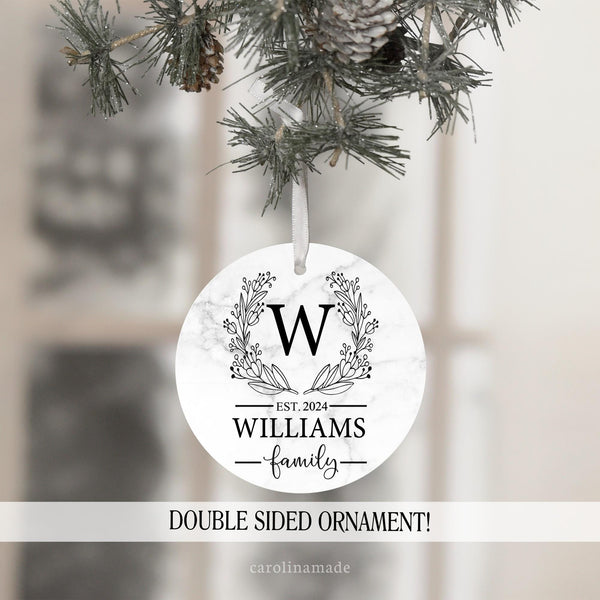 Monogram Christmas Ornament with year and family name. Featuring white marble printed background.