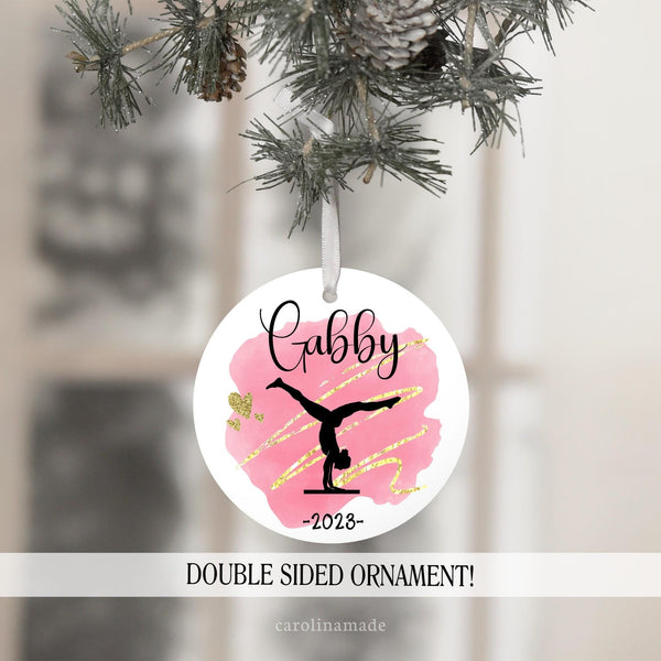 Beautiful aluminum ornament with watercolor background and three gymnast positions. Personalize with a name and the year.