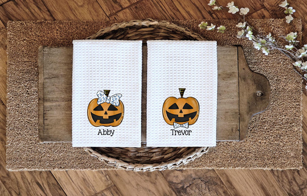 this listing features matching boy and girl pumpkins and is personalized with a name under it.