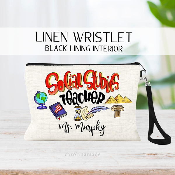 This linen zipper pouch features the words Social Studies big at the top, with clipart under it. Globe, Book, Declaration of Independence, pyramids, etc.  It is personalized at the bottom with your teachers name.