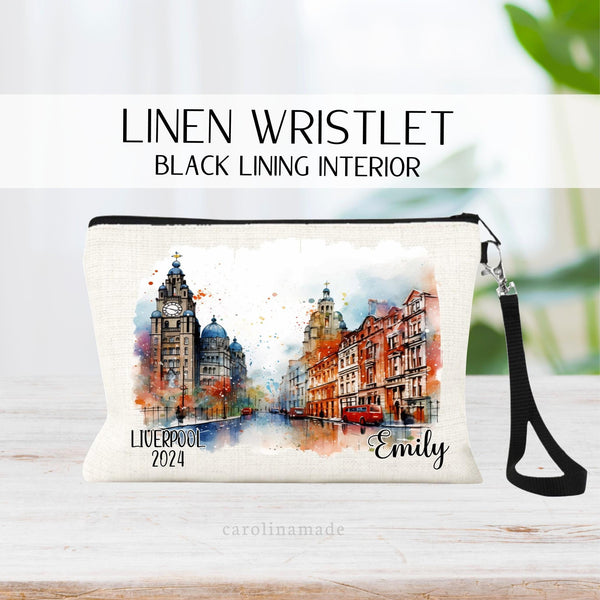 Beautiful watercolor design of Liverpool England in the middle of this linen wristlet bag. It is personalized with your name on bottom right, with Liverpool and the year on the bottom left.