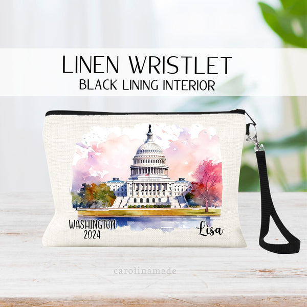 Beautiful watercolor design of the White House in Washington DC in the middle of this linen wristlet bag. It is personalized with your name on bottom right, with Washington and the year on the bottom left.
