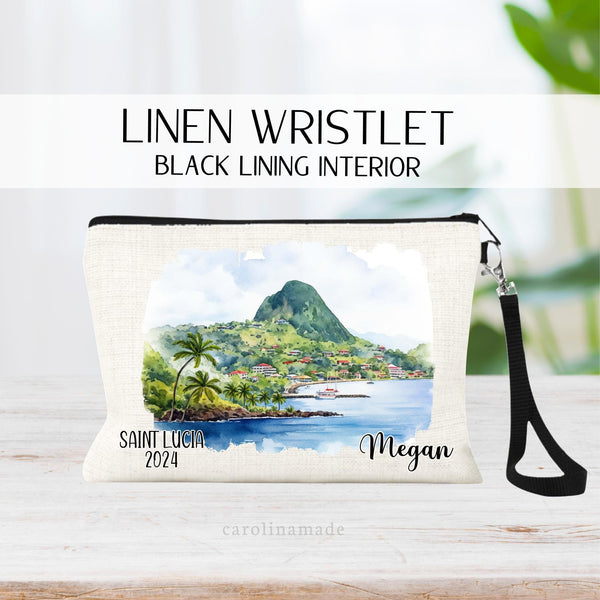 Beautiful watercolor design of Saint Lucia in the middle of this linen wristlet bag. It is personalized with your name on bottom right, with Saint Lucia and the year on the bottom left.