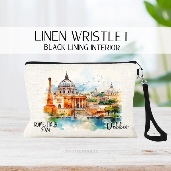 Beautiful watercolor design of Rome Italy in the middle of this linen wristlet bag. It is personalized with your name on bottom right, with Rome Italy and the year on the bottom left.