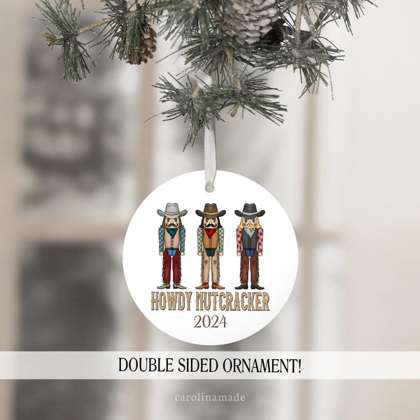 this fun christmas ornament features a row of cowboys. the bottom says howdy nutcracker.