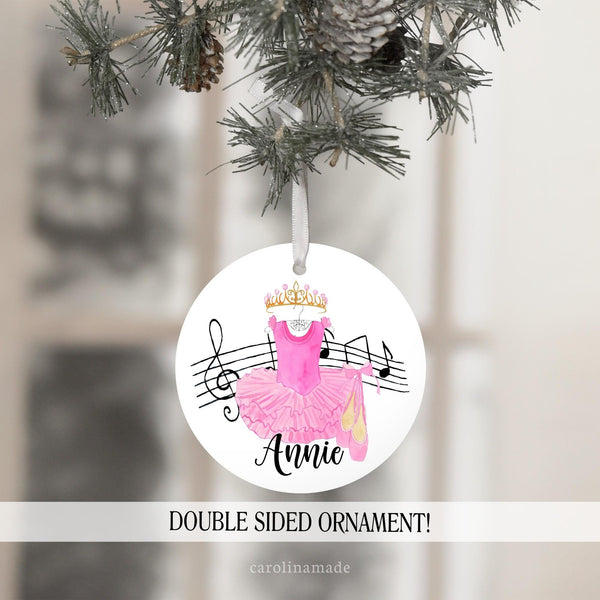 This beautiful ornament features a dance leotard with ballet slippers, a crown, and musical notes. Personalize it with your ballerinas name!