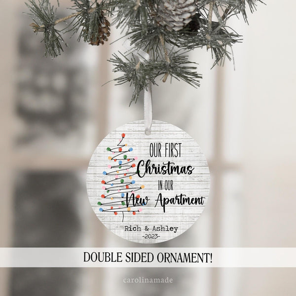 Our first Christmas in our New Apartment. Printed wood background with line art christmas tree. And personalized with names and year at the bottom.