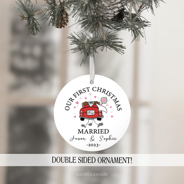 our first christmas married featuring red car with cans following. Personalized with name and year.