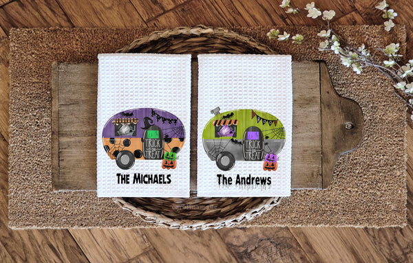 White waffle weave towels with fun halloween camper design. personalize the bottom with your family name.