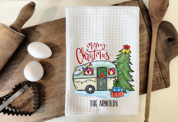 White waffle weave towels with fun Christmas camper design. personalize the bottom with your family name.