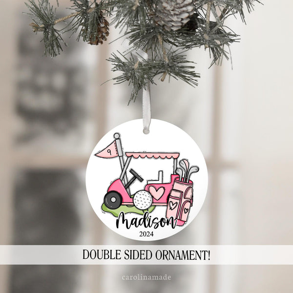 This white Christmas Ornament features a fun girly golf  cart, ball and tee, golf club bag, grass and a hole marker. It is personalized with name at the bottom and the current year.