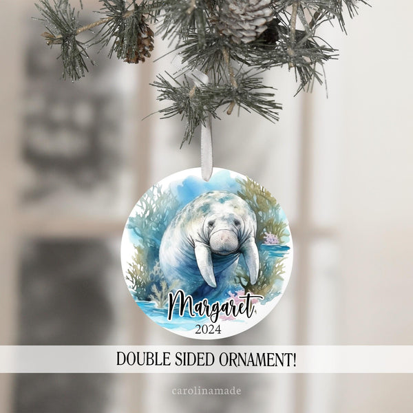 This ornament features a watercolor under water sea design with a manatee in the center. It is personalized on the bottom with your name and the year.
