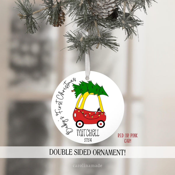 Babys First Year Christmas Ornament with red car, christmas tree, and string lights. Personalized at the bottom with name and year.