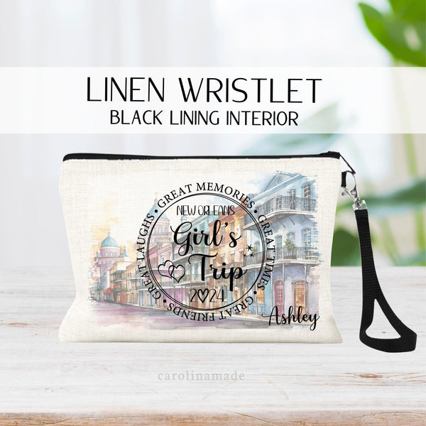 This linen zipper pouch features a new orleans theme background with a circle in the center that says girls trip and the year. Great memories great times great friends great laughs. It is personalized in the corner with your name.