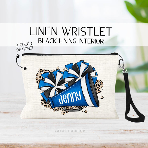 This linen zipper pouch features your choice of 7 pom pom color combinations. And is personalized with your cheerleaders name.