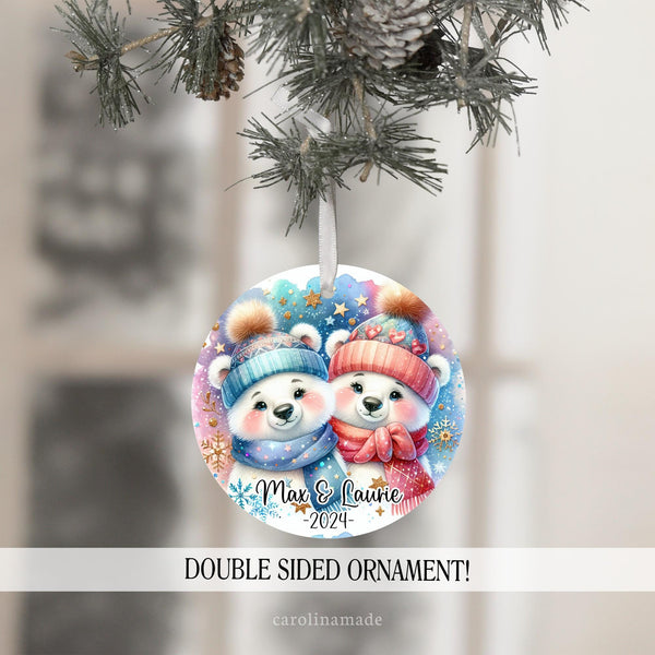 This ornament features two polar bears that could be siblings or a couple. Personalize the bottom with names and a year.