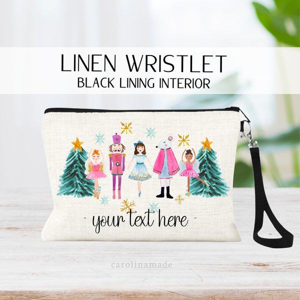 This linen zipper pouch features beautiful watercolor design with two Christmas Trees and the characters from the Nutcracker. Your personalized text at the bottom.