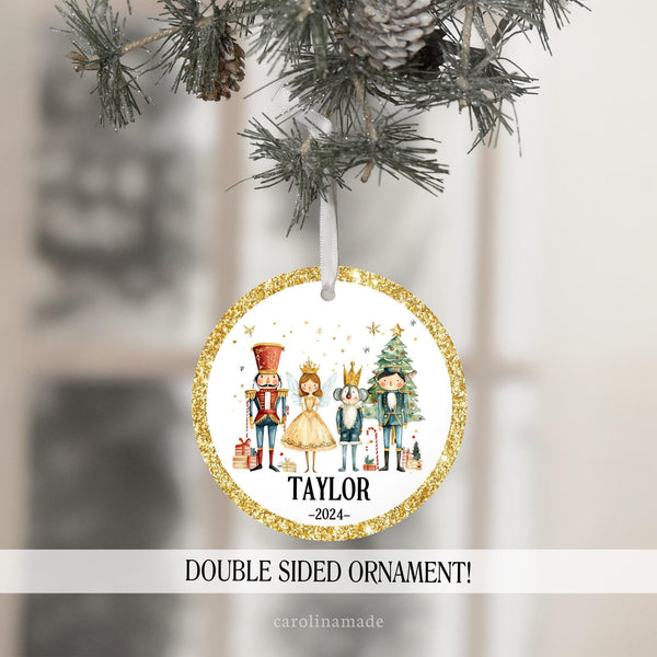 This beautiful ornament features a gold and white background with classic nutcracker characters. Your name is personalized at the bottom with the year. or customize with your starring role in the ballet.