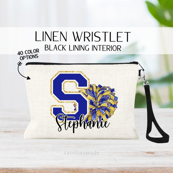 This linen zipper pouch features a large varsity style letter with your choice of 40 cheer pom pom colors and is personalized at the bottom with your cheerleaders name.