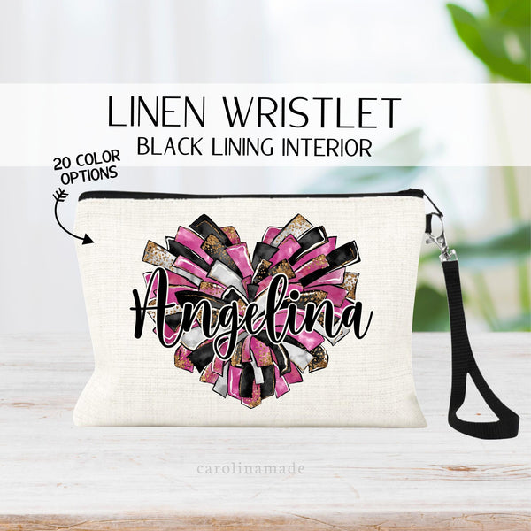This linen zipper pouch features a large pom pom heart in the center in 20 different color options with gold glitter accents. It is personalized in the center with your cheerleaders name.