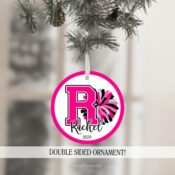 This ornament features a color design with cheer pom poms and a large varsity letter in matching colors. The ornament is personalized at the bottom with your cheerleaders name and the year.