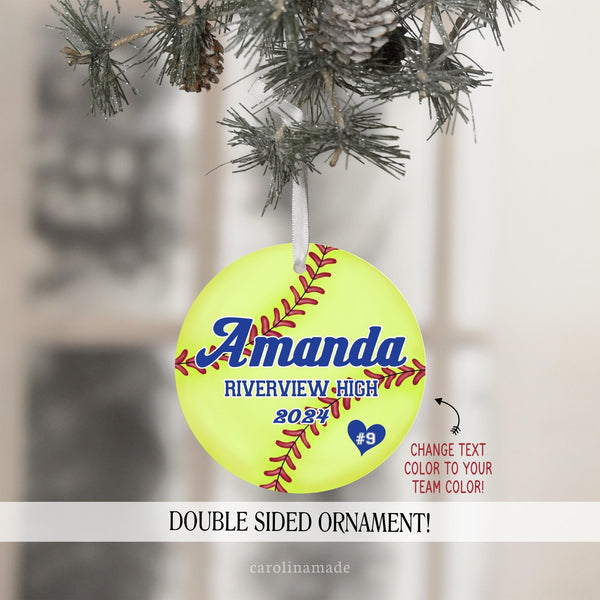 This ornament features a large softball design in the background and is personalized with your name, your school or team name, and the year. There is a heart with your jersey number on the bottom. Customize with your team colors.