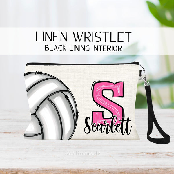 This fun linen wristlet makes a great Volleyball gift! Large Volleyball on the left side of the bag. And choose your text layout. Bag shown shows large inital & name. Or choose to have jersey number or school on the bag instead.