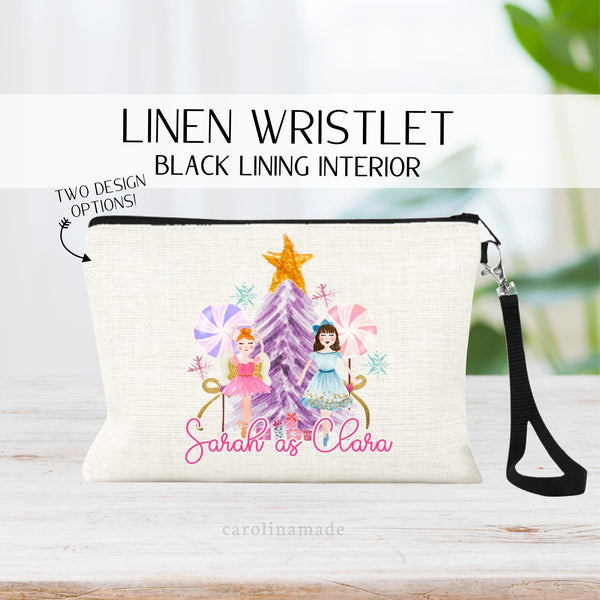 This linen zipper pouch features a purple tree with gold star, two nutcracker characters. The text has Nikki as Clara. The text can be changed to whatever you want it to say.