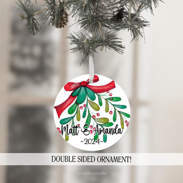 Couples Mistletoe Christmas Ornament that is personalized at the bottom with name and the year.