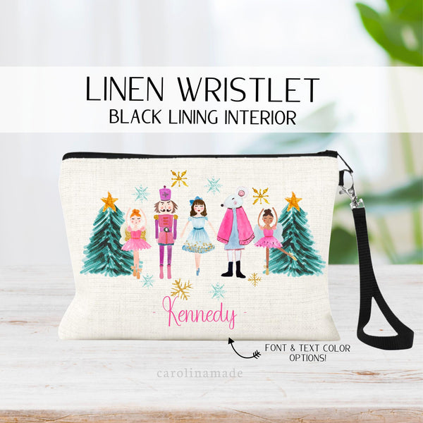 This linen zipper pouch features beautiful watercolor design with two Christmas Trees and the characters from the Nutcracker. Your personalized text at the bottom.