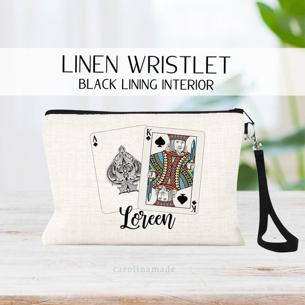 Dont forget your wristlet purse your next casino trip! This bag features two playing cards for winning blackjack card game. Ace and king. It is personalized at the bottom with your name.
