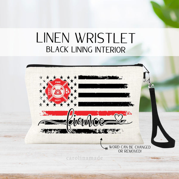 This linen zipper pouch features a distressed american flag with a thin red line for the fire department. It shows a fire dept symbol over the stars. And is personalized at the bottom to says  fiance, wife, girlfriend, etc.