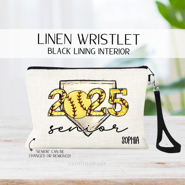 This linen zipper pouch features 2025 in the center in softball colored letters with a diamond plate behind it and the word senior at the bottom. Personalize the bag with a name in the corner.