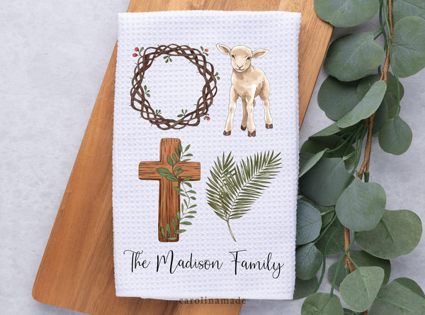 This white waffle weave towel is the perfect personalized decor for Easter. It features a thorn crown, the lamb, cross and palm leaves. Your family name is at the bottom.