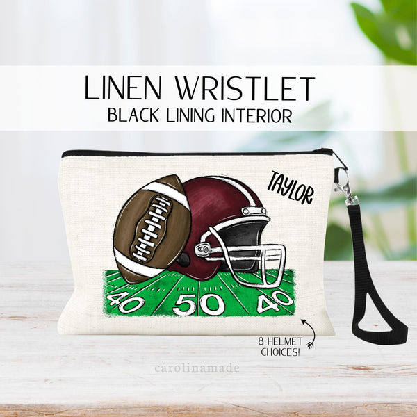 This linen zipper pouch features a fun football design with a field, ball and helmet. It comes in your choice of 8 helmet colors and is personalized with a name in the top right corner.