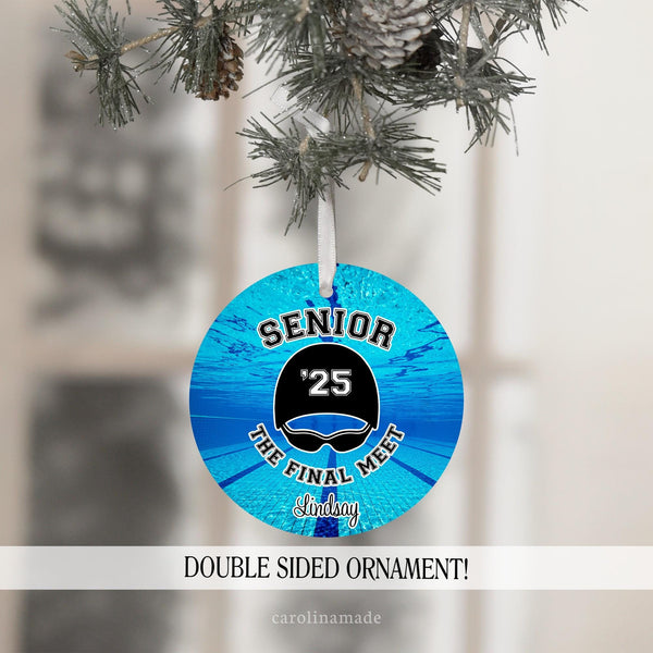 This double sided ornament features a swimming lap pool in the background with senior at the top and The final Meet at the bottom. It personalized with your swimmers name at the bottom and the graduating year in the center.