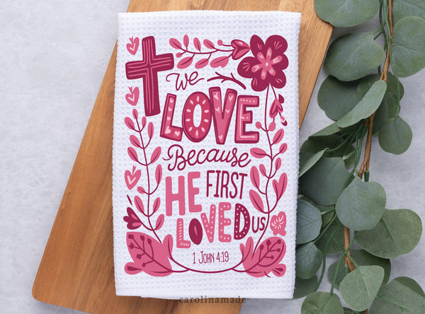 We love because he first loved us 1 John 4 19 Pink floral Valentines Day Hand Towel design on white waffle weave tri fold towel.