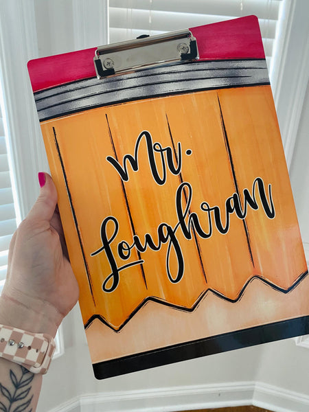 This fun clipboard design features a hand drawn pencil and is personalized in the center with the teachers name. The perfect personalized teacher appreciation gift!