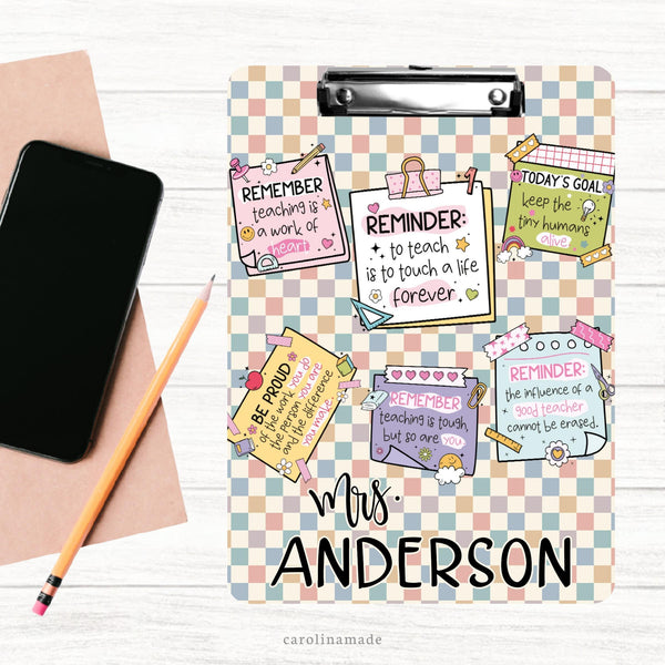 This double sided clipboard features a printed multi color checkered background with printed sticky notes that have teacher affirmations on them. The bottom is personalized with teachers name.