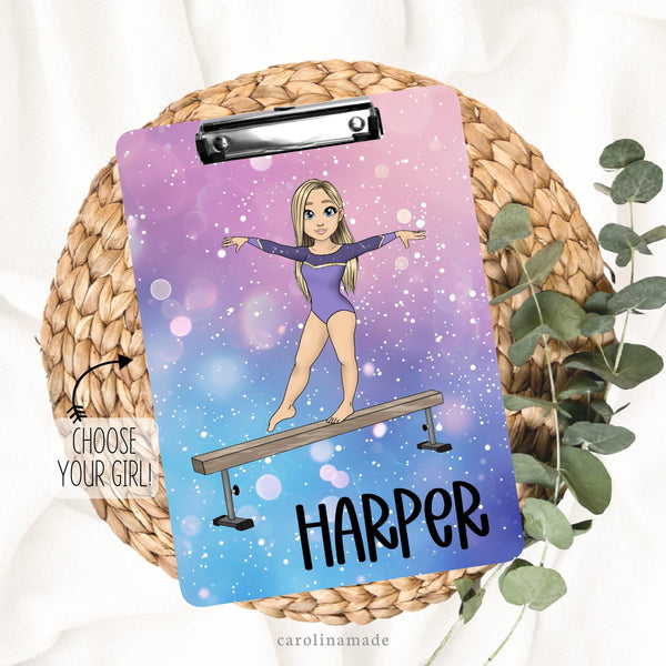 This double sided clipboard features a pink, purple and glitter background with your choice of custom gymnast on a beam. It is personalized at the bottom with your name.