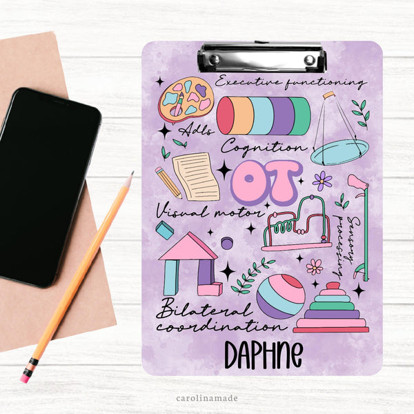 This colorful double sided clipboard features a purple watercolor background with occupational therapy clip art all over. It is personalized at the bottom with a name.