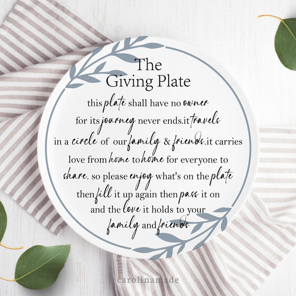 This 10 inch white serving plate features The Giving Plate poem on it. There is a blue wreath around the edge.