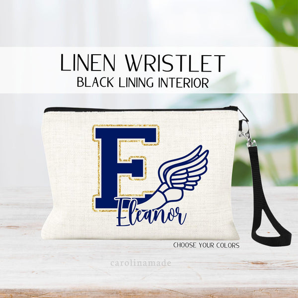 This linen bag features a large varsity letter of the runner initial and a track shoe with wings next to it. The bag is personalized also with the persons name. Customize to your school colors.