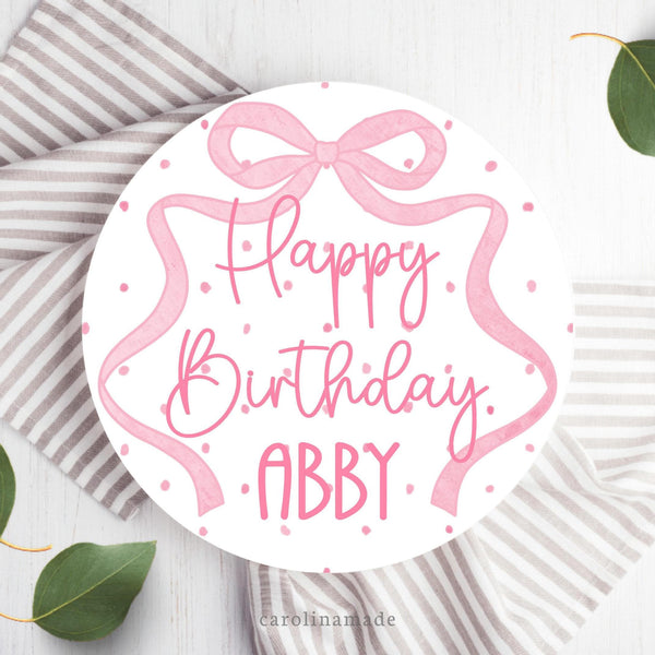 This ten inch plate features a pink poka dot plate with a long ribbon bow around the plate. It is personalized with your childs name.